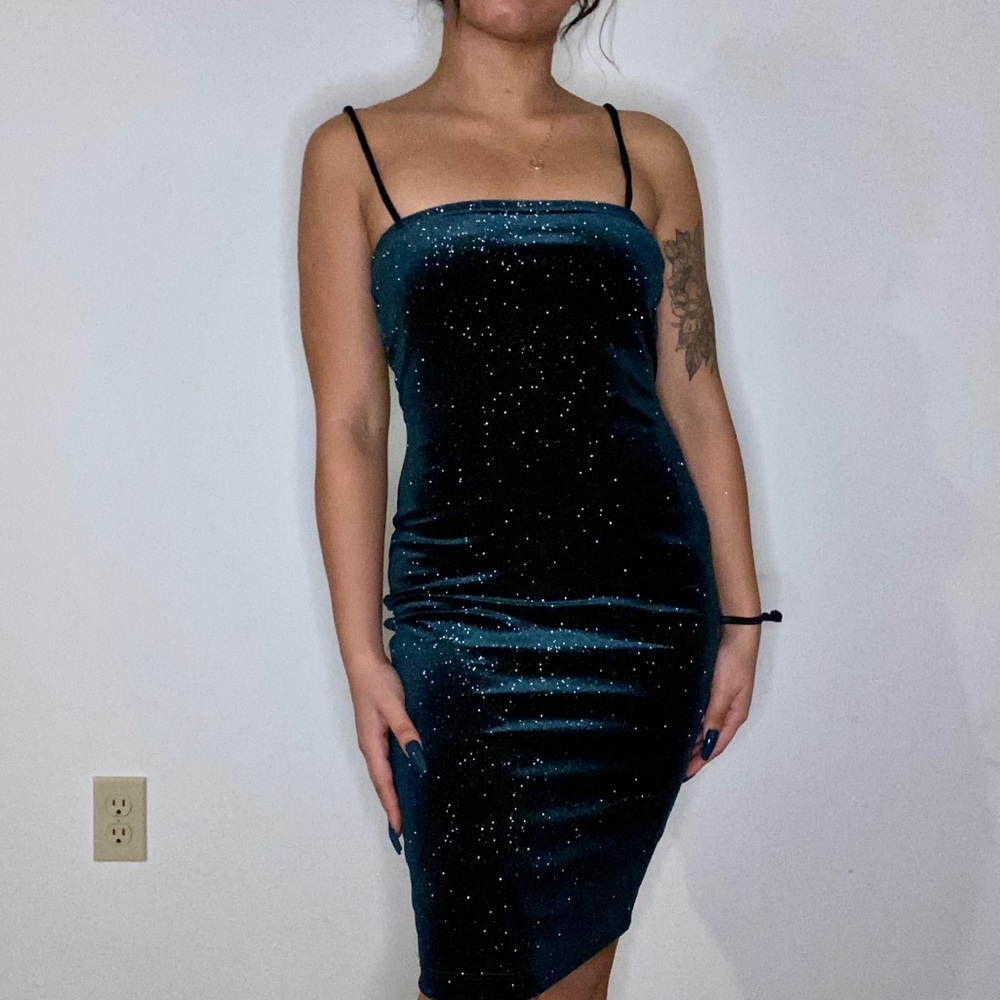 Sparkly emerald green body con dress